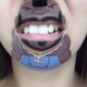 Illustration for article titled Girl transforms her mouth into cute famous characters with just makeup